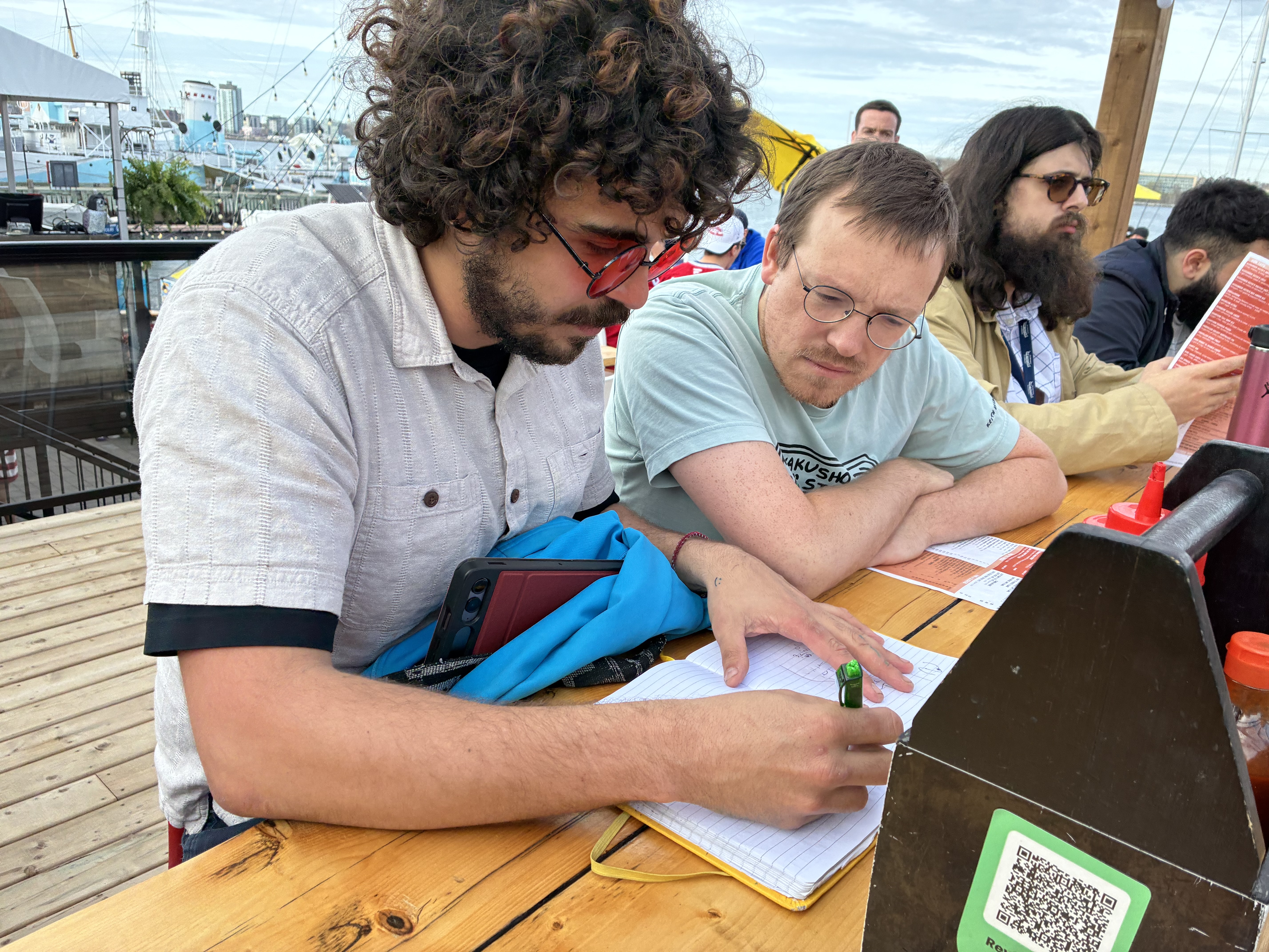 Daniel Teixeira and Campbell Wheeler in mathematical conversation